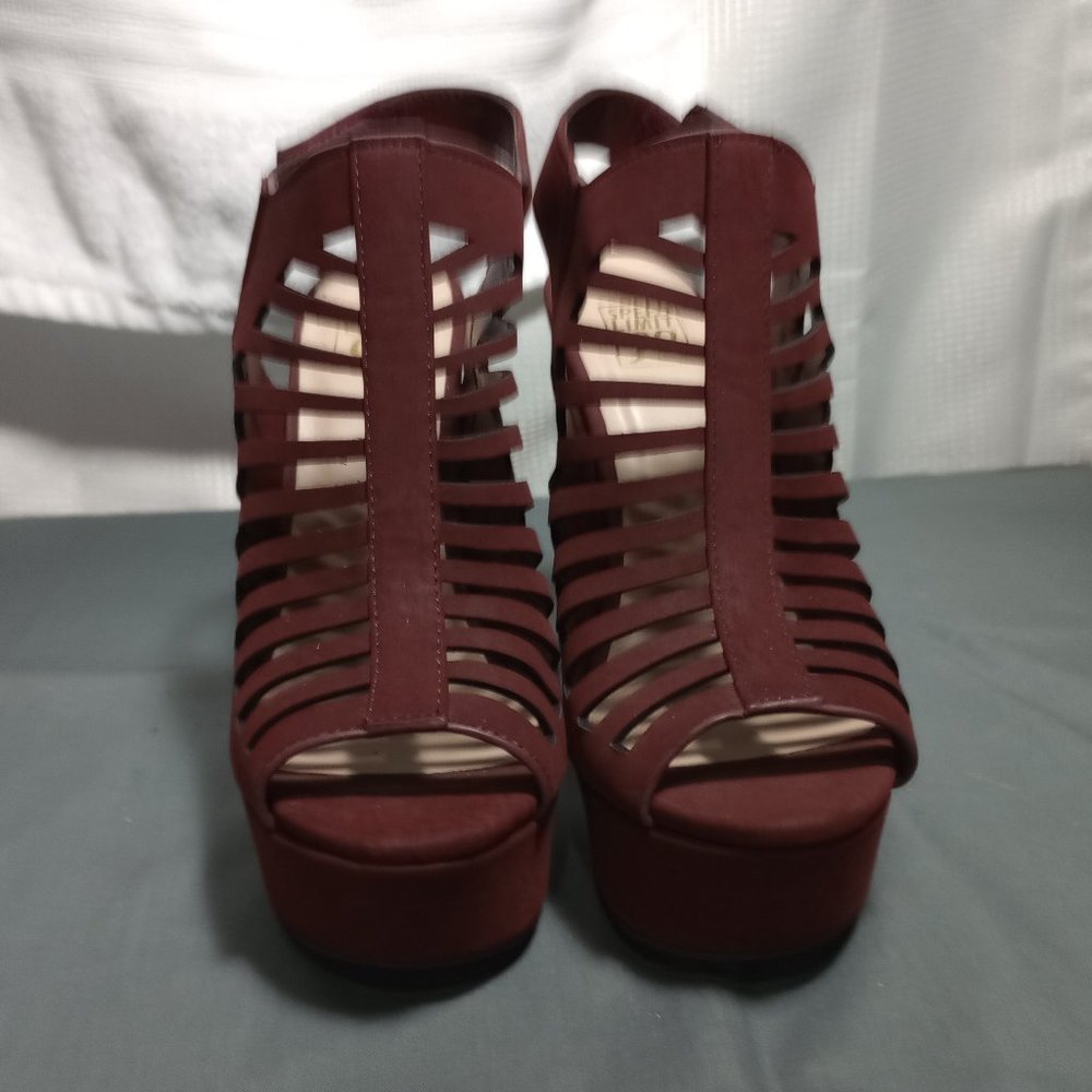 A PAIR OF VELOUR HEELS SPEED LIMIT 98
